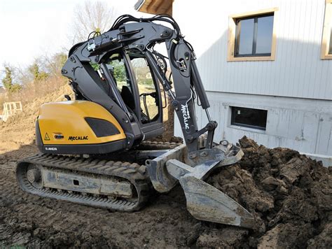 should i buy a skid steer or mini excavator|mini excavator skid steer combo.